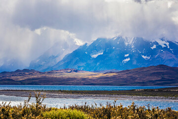 Turquoise Glacial Lake Lago Del Toro In Front Of The Mountain Range, Torres del Paine National...