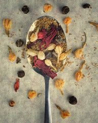 Dried different herbal tea with spoon.Top view.Rustic style.Close up.