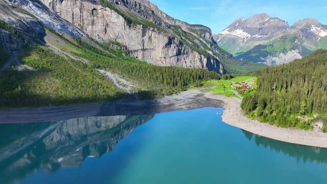 amazing crystal clear alpine lake in Switzerland, aerial view of turquoise alpine lake, glacial lake in the Swiss mountains, peaceful meditation landscape