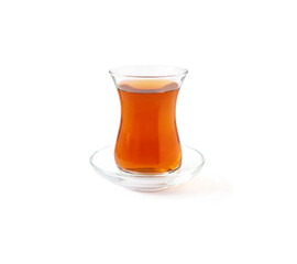 Turkish armudu glass on saucer with black tea isolated on white background