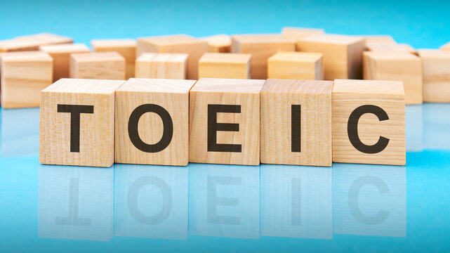 word toeic made with wood building blocks, business concept