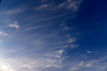 Evening sunset sky with blue and yellow clouds