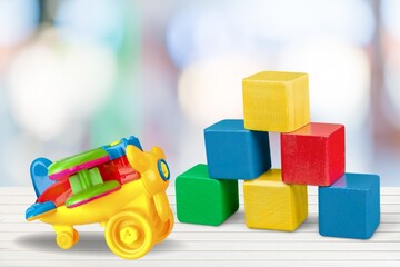 old toy. Mother or father with baby concept. Vintage style filtered photo