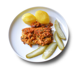 Baked chicken with garnish on a plate