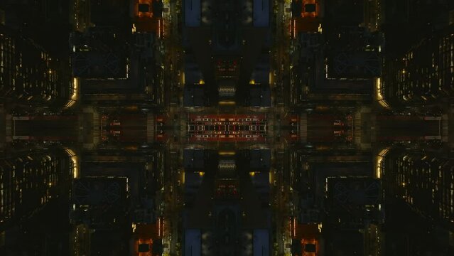 Top town shot of streets and buildings in large city at night. Abstract computer effect digital composed footage.
