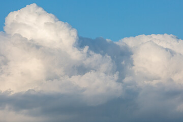 Looking up at textured clouds and blue sky