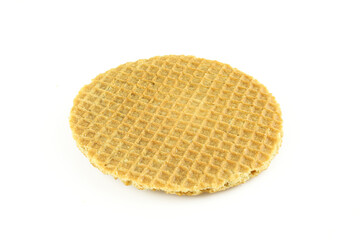One whole caramel waffle. Stroopwafel isolated on white background
