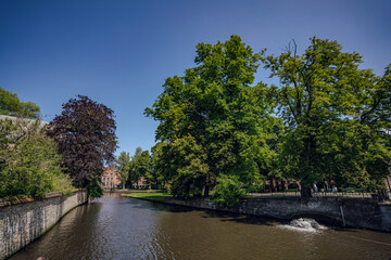 Fototapeta na wymiar The Minnewater (or Lake of Love), a fairytale scene - Bruges