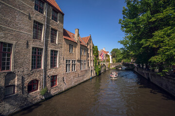 Fototapeta na wymiar Canal in Bruges - Houses and Streets - Bruges, Belgium - the city centre