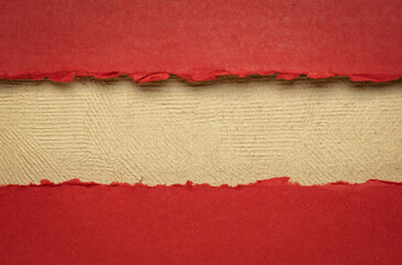 paper abstract in red and beige with a copy space - sheets of handmade paper, blank web banner