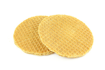 Two whole stroopwafels isolated on white backrgound. Golden colour caramel waffles