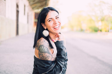 Young tattooed woman summer portrait - 509242514