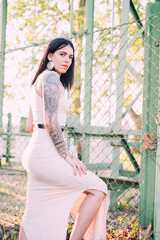 Young tattooed woman summer portrait - 509242535