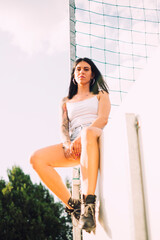Young tattooed woman summer portrait - 509242585
