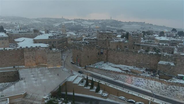 The old city of Jerusalem covered with snow, aerial
Drone footage from East Jerusalem in the winter, old city, israel, 2022
