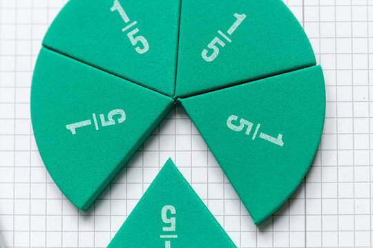 Close up of math fractions on the open notepad. Back to school concept. Creative mathematics, study, education.  - Powered by Adobe