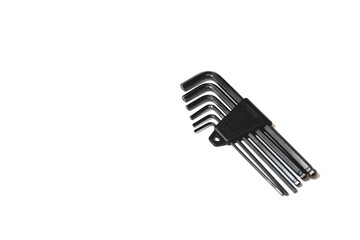 A set of black hexagons in a plastic case, isolated on a white background, a tool for repair work