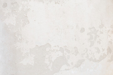 Vintage concrete texture with cracks and scratches. White wall
