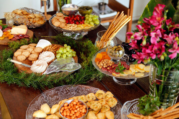 Obraz na płótnie Canvas Table with snacks - party buffet with various savory foods