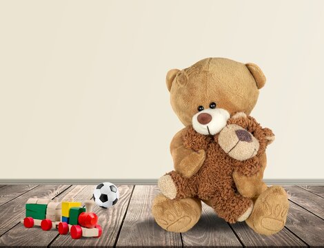 Teddy Bears family, old toy. Mother or father with baby concept. Vintage style filtered photo