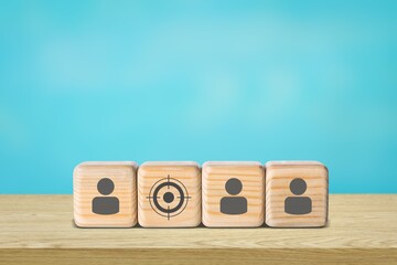 Target customer, buyer persona, marketing segmentation, job recruitment concept. Wooden cubes with focused on target customer symbols.