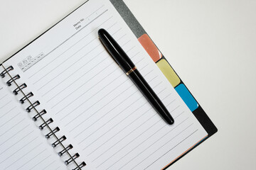 A fountain pen and paper for notes and memos. For new plans for the new year. Pen and paper for studying.