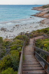 Stairway going to white sand blue crystal water beach - West beach, Esperance WA, Australia