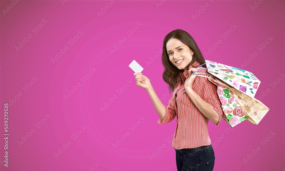 Poster Beautiful women holds credit card. Online shopping and excited with success payment concept