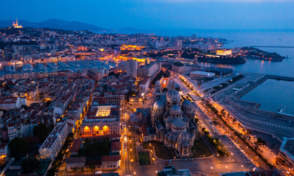 Bird's eye view of Marseille at dusk. Marseille Cathedral visible from above. © JackF
