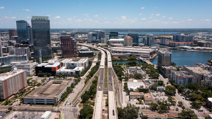A centered aerial view from over the Selmon Expressway leads you right through downtown Tampa, FL.