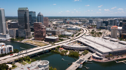 An aerial view from over Davis Island shows the Selmon Expressway running next to the iconic Tampa convention center in downtown Tampa, FL.