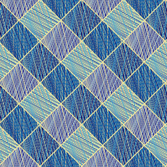 Seamless pattern of blue and gold hatched diamonds. Abstract geometric backdrop. Colorful texture for textile design