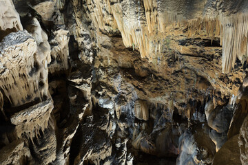 Picture of cave Grotte des Demoiselles illuminated inside, France..