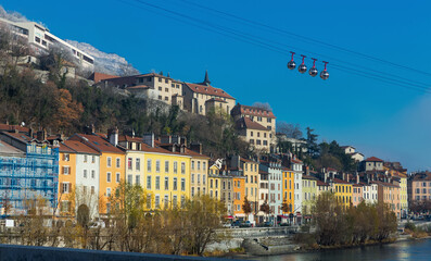Fototapeta premium Picture of view of French Alps and Grenoble cable car in autumn, France