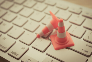 Maintenance, repair, under construction in computer system from virus or ransomware concept. Close...