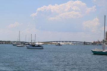 boats floating in the harbor of destin, florida