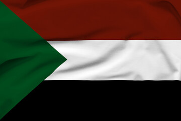 Obraz premium Sudan national flag, folds and hard shadows on the canvas