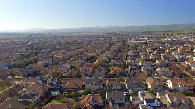 Aerial View Of Houses In The Community In San Joaquin County. Mountain House In California, USA. drone ascend