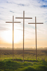 Three Christian Crosses at Sunrise