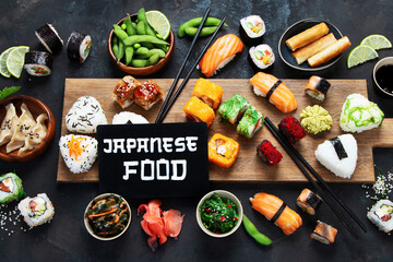 Japanese food assortment on dark background.