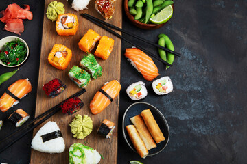 Japanese food assortment on dark background.