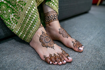 Indian Punjabi bride's wedding henna mehendi mehndi feet close up