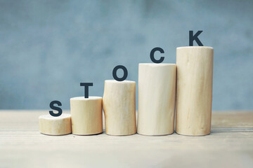 stock goes up. money concept. word wood type.