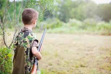 Foto op Plexiglas Boy With Shotgun While Dove Hunting © Jennifer