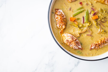 healthy plant-based food, vegetable green curry with vegan wonton dumpling