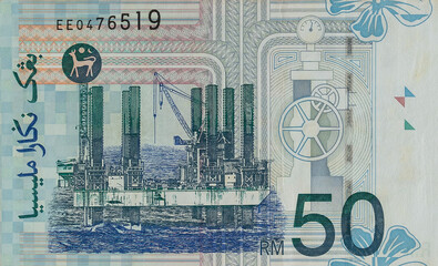 Close up on Malaysian Ringgit banknote. Malaysian money or bank notes. 