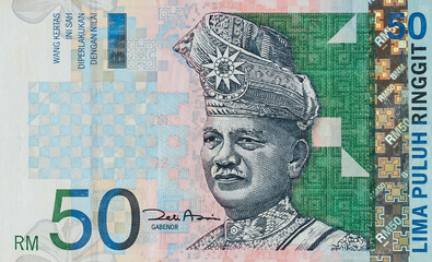 Close up on Malaysian Ringgit banknote. Malaysian money or bank notes. 