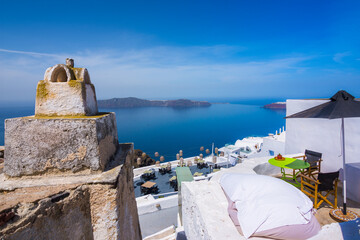 Fototapeta na wymiar Fira town, with view of caldera, volcano and cruise ships, Santorini, Greece. 
