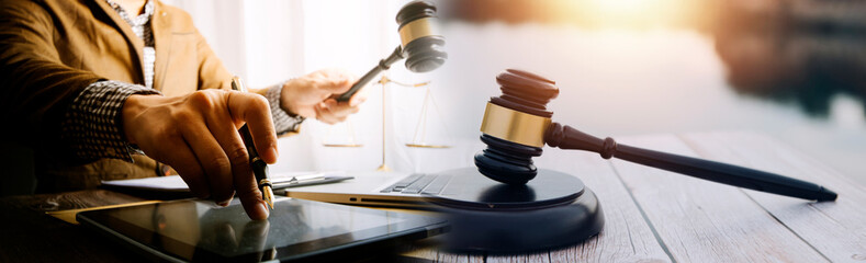 Judge gavel with Justice lawyers having team Concepts of Law and Legal services