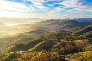 Fototapeta premium Ban Bon Na Viewpoint at sunrise with fog above Mae Chaem, Doi Inthanon national park, Chiang Mai, Thailand
